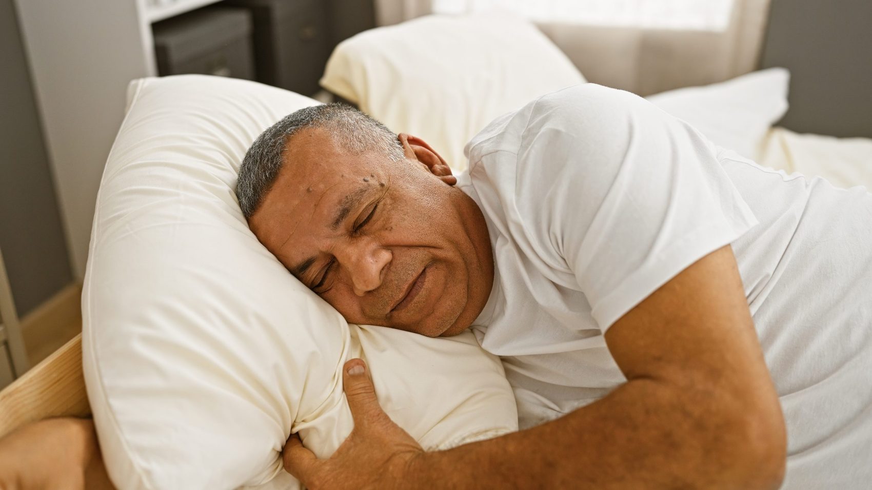 man sleeping for peak performance and recovery